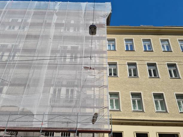 facade on an old building with scaffolding stock photo