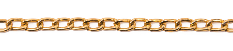 gold chain links close up isolated