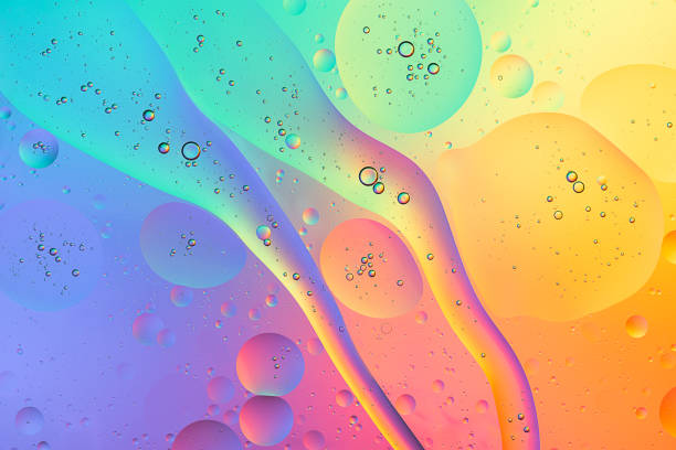 istock abstract background rainbow colorful macro photography oil and water 1251812079