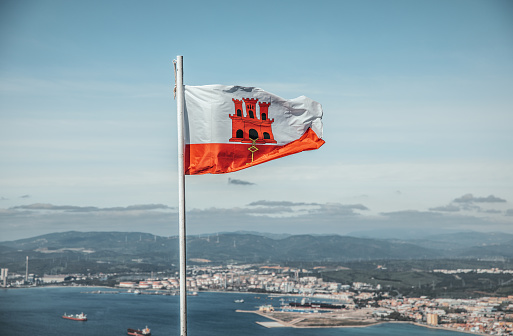 Flag of Switzerland with cloud in background