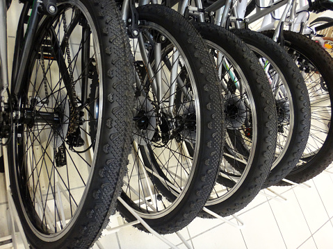 bicycle wheels and tires in store on sale in a range of sporting goods