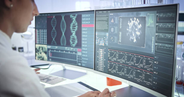 istock Attractive female microbiologist studying coronavirus. Futuristic lab 1251894572