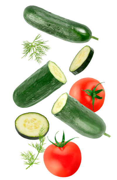 istock Flowing vegetables isolated on white background with shallow depth of field 1251897816