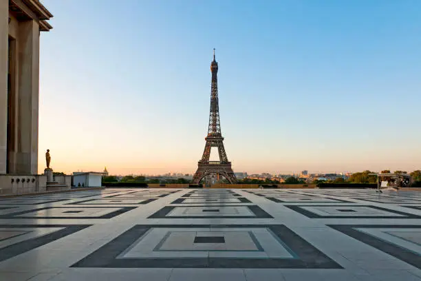 Sunrise on Tour Eiffel. The Trocadero place is empty during pandemic Covid 19 virus in Europe, without  tourists. Paris, in France. June 23, 2020.