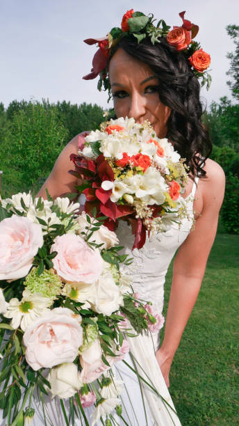 istock The bride smells her bouquet. 1251901613