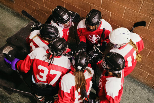 istock Woman's Hockey Team Celebrating 1251903265
