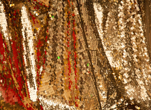 istock Bright golden shiny blurred Christmas backdrop of glittered surface with copy space 1251921371