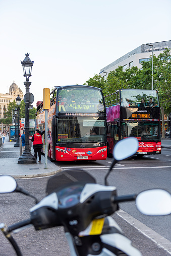 Barcelona, Spain - June 01,2017: Tourbus waiting at bus stop in Plaza De Catalunya (Catalonia Square), Barcelona, Spain.