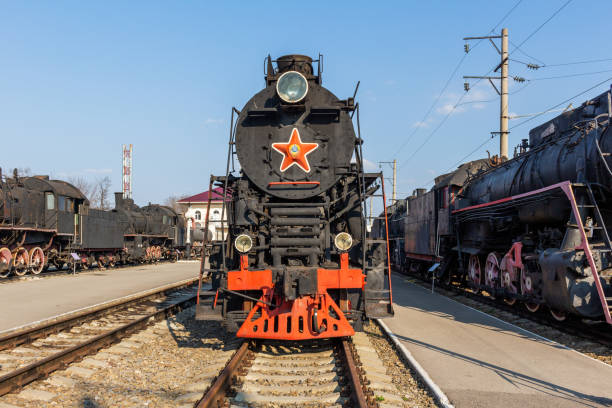 istock Old vintage retro train. Historical railroad transport. 1251938132