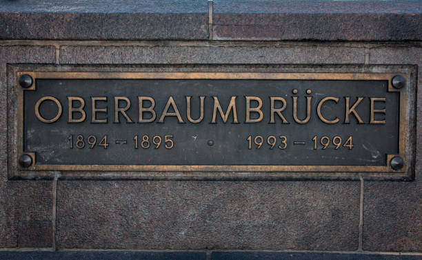 Berlin, Germany - June 21, 2020:  Close up of the plate of Oberbaum Bridge in Berlin. The text on the metal sign says \