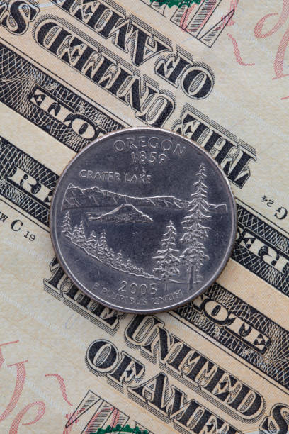 istock A quarter of Oregon on US dollar bills. 1251957214