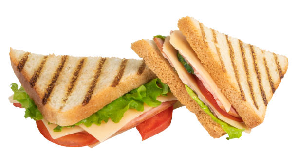 istock Sandwich with ham, cheese, tomato, lettuce and toasted bread isolated on a white background 1251957342