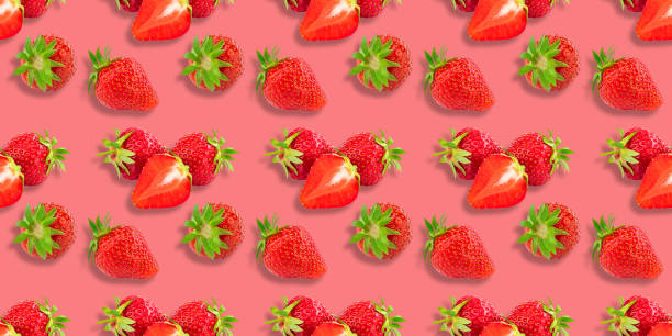 istock Colorful pattern of strawberries on pink background. Top view. Seamless 1251957350