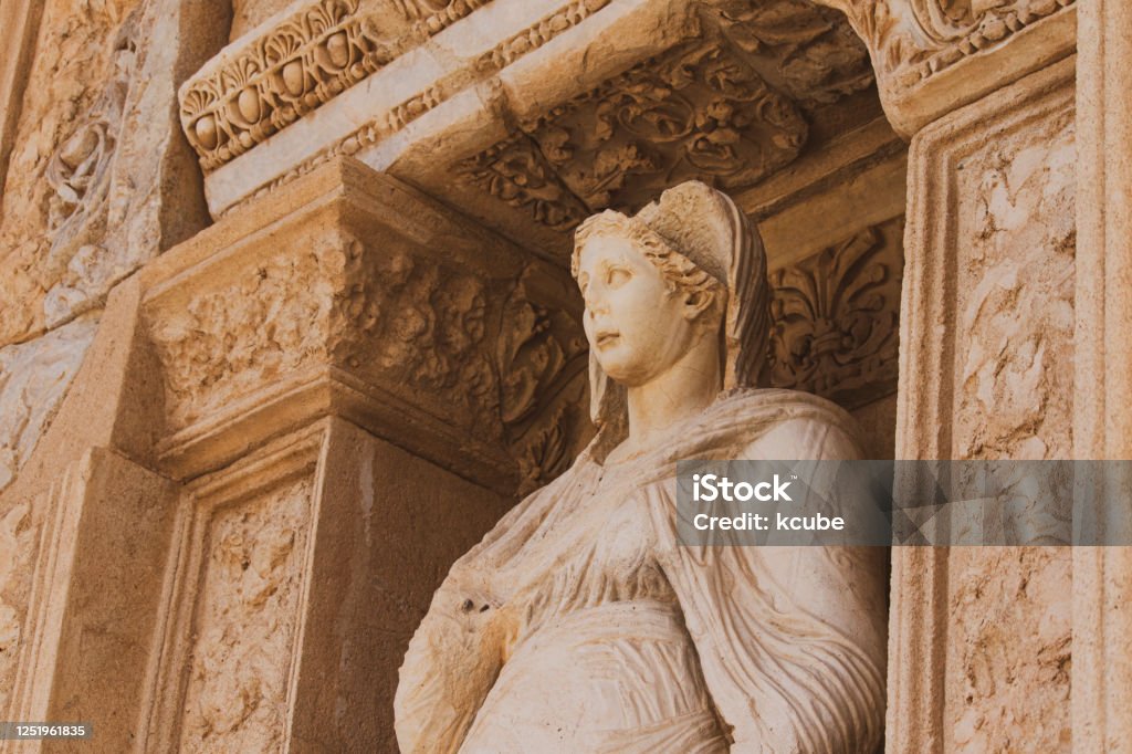 Statue of Arete in Ephesus Statue of Arete (virtue/valor) which is located on the facade of library of Celsus in  Greek ancient city of Ephesus, Turkey. Ancient Stock Photo