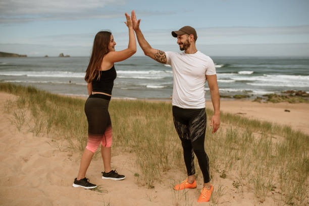 istock Young couple giving a high five after sport 1251975021