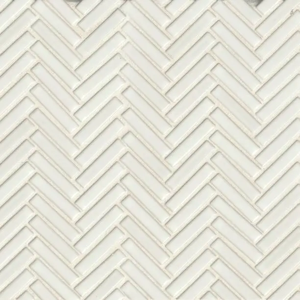 Photo of Herringbone mosaic porcelain tile texture white