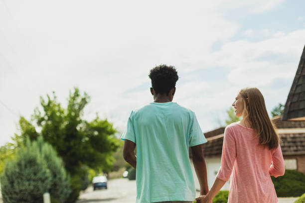 istock Multi Ethnic Heterosexual Generation Z Couple Holding Hands 1251999810