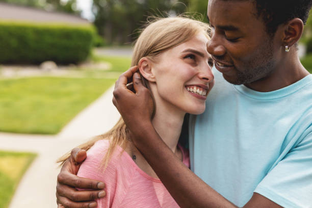 istock Multi Ethnic Heterosexual Generation Z Couple Holding Hands 1252010372