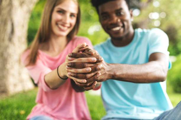 istock Multi Ethnic Heterosexual Generation Z Couple Holding Hands 1252016019