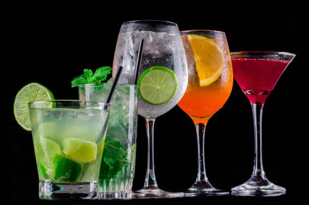 istock colorful cocktails on black background 1252032258