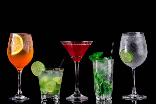 istock colorful cocktails on black background 1252032268