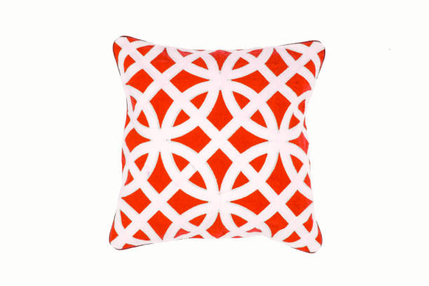 istock Decorative soft pillow, with geometric pattern in red and white color, isolated on white background. 1252032586