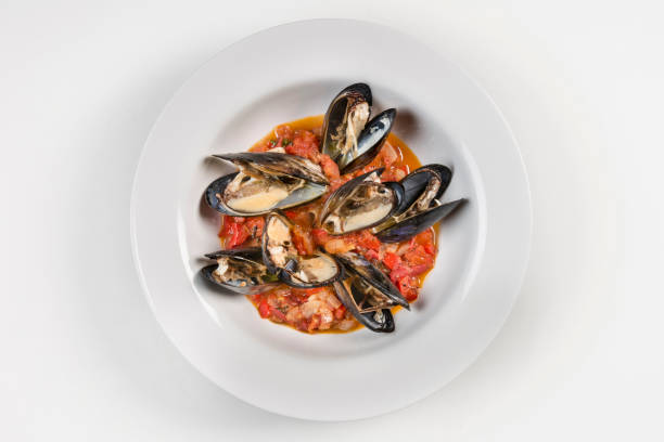 Wine and tomato recipe used in this mussel seafood plate