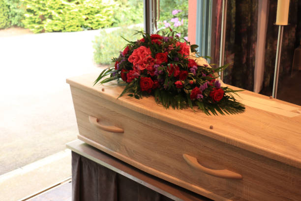 istock A coffin with a flower arrangement in a morgue 1252039702