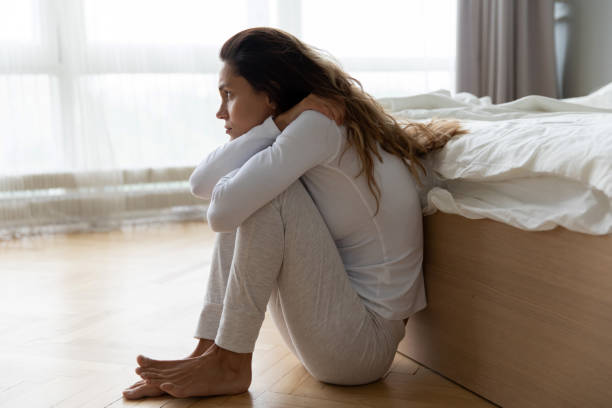 istock Pensive girl look in distance thinking or mourning 1252120032
