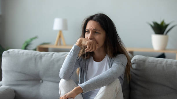 istock Upset young woman look in distance thinking 1252120039