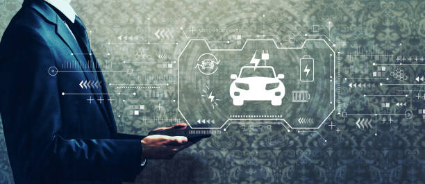 istock EV with businessman holding a tablet 1252123882