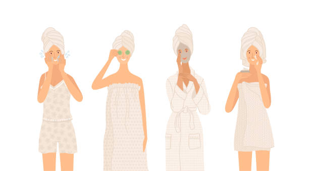 красивые молодые женщины в полотенце, пижаме и халате заботятся о своей коже - wrapped in a towel illustrations stock illustrations