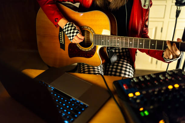 istock Close up of a guitar player 1252124503