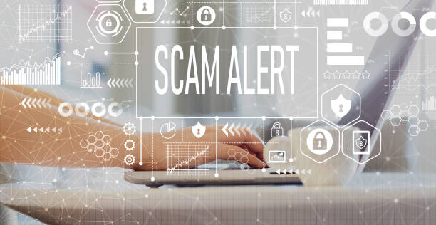 Scam alert with woman using a laptop Scam alert with woman using a laptop on a coffee table white collar crime photos stock pictures, royalty-free photos & images