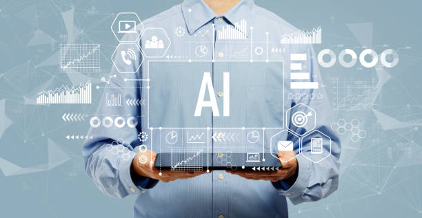 istock AI concept with man holding a tablet 1252125694