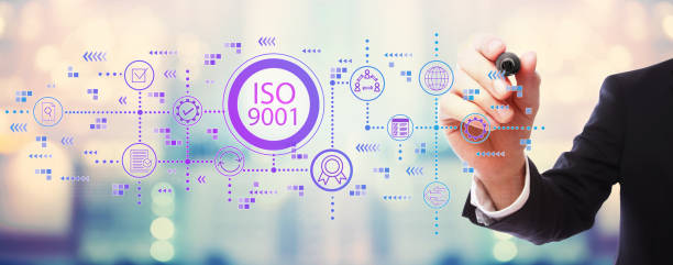 istock ISO 9001 with businessman 1252125751