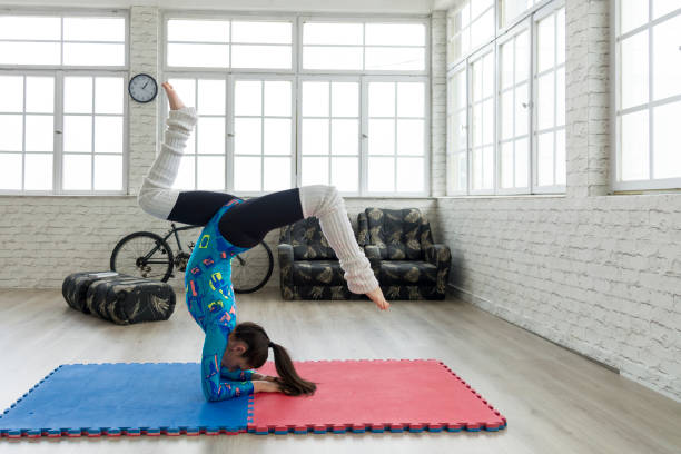 istock Young sporty woman practicing yoga 1252126860