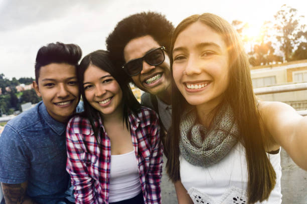 istock Young diverse group of friends taking a selfie smiling at camera 1252179148