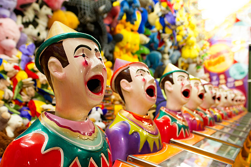 Fairground clowns lined up in a row