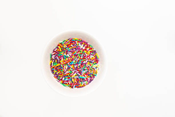 istock Cake decoration sprinkles isolated on a white background with copy space 1252192787