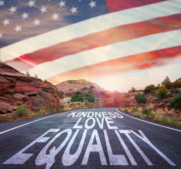istock Equality Love Kindness Road Sign with US flag 1252202623