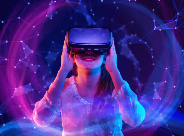 istock Woman with glasses of virtual reality. Future technology concept. 1252257640