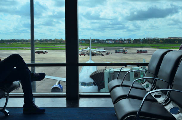 Waiting for journey Waiting in airport lobby for journey india airport stock pictures, royalty-free photos & images