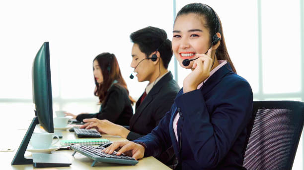 Business people wearing headset working in office
