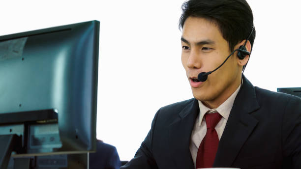 Business people wearing headset working in office