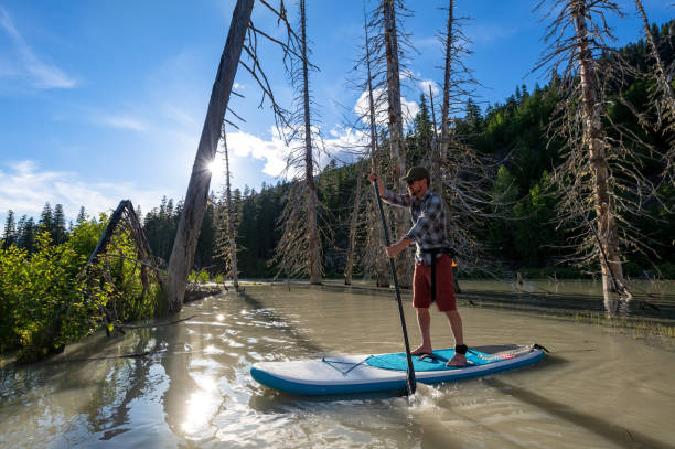 istock Paddleboard adventure in the mountains 1252264906