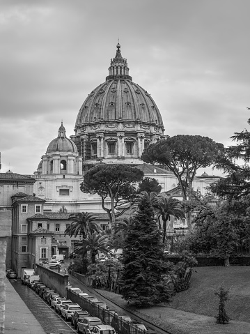 Vatican City State - November 8, 2019: The Saint Peter's Basilica in Vatican City on a rainy day. Black and white retro style - monochrome color tone.
