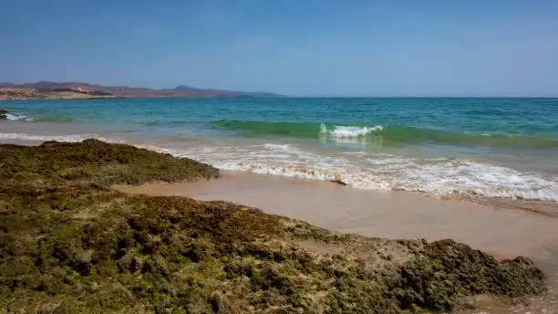 Costa Calma, a pristine shallow-water turquoise beach in the south-east of the island, delighting tourists with great swimming and water sports opportunities, in Fuerteventura, Canary Islands, Spain.