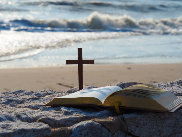 istock bible  and wood holy cross 1252284967