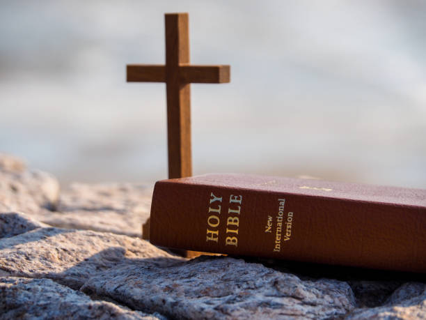 istock Bible and wood holy cross 1252284998